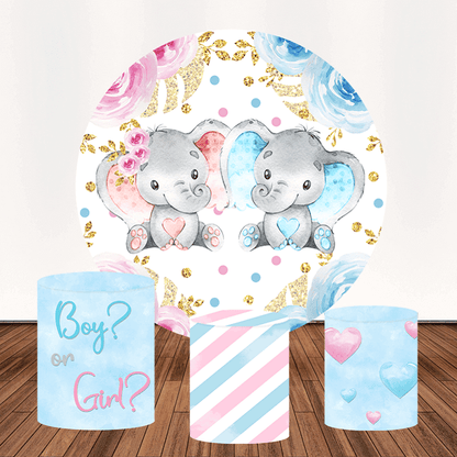 Three-piece gender reveal set featuring a round elephant-themed backdrop with pink and blue details, accompanied by three cylinder covers showcasing hearts, stripes, and "Boy or Girl?" text. Perfect for baby showers and gender reveal parties.