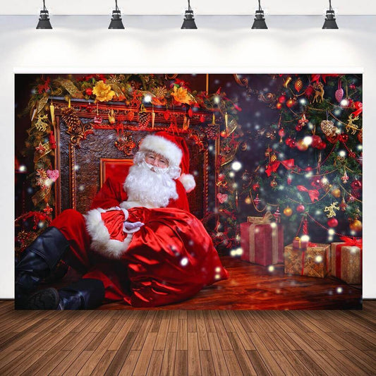 Christmas backdrop featuring Santa Claus lounging on a grand red chair, surrounded by a decorated tree, festive ornaments, and wrapped gifts.