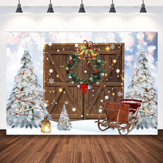 Festive Christmas backdrop featuring a rustic wooden door with a wreath, snow-covered trees decorated with lights, and a vintage sleigh in a snowy scene. Perfect for holiday decor or photo shoots.