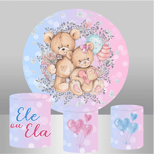 Teddy bear-themed gender reveal backdrop set with a round backdrop featuring two teddy bears surrounded by pink and blue balloons and floral accents, paired with three plinth covers displaying 'He or She' text, pink balloons, and blue balloons.