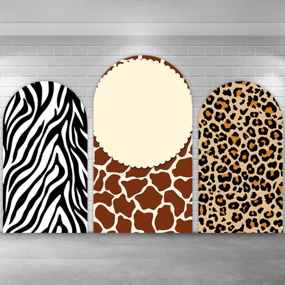 Three-piece safari-themed arch backdrop set featuring zebra, giraffe, and leopard prints. Perfect for jungle-themed parties or events.