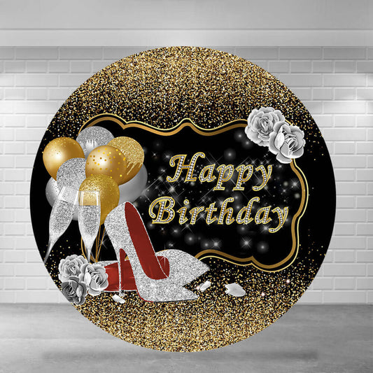 Elegant black and gold round birthday backdrop featuring glitter details, high heels, champagne glasses, golden balloons, and roses.