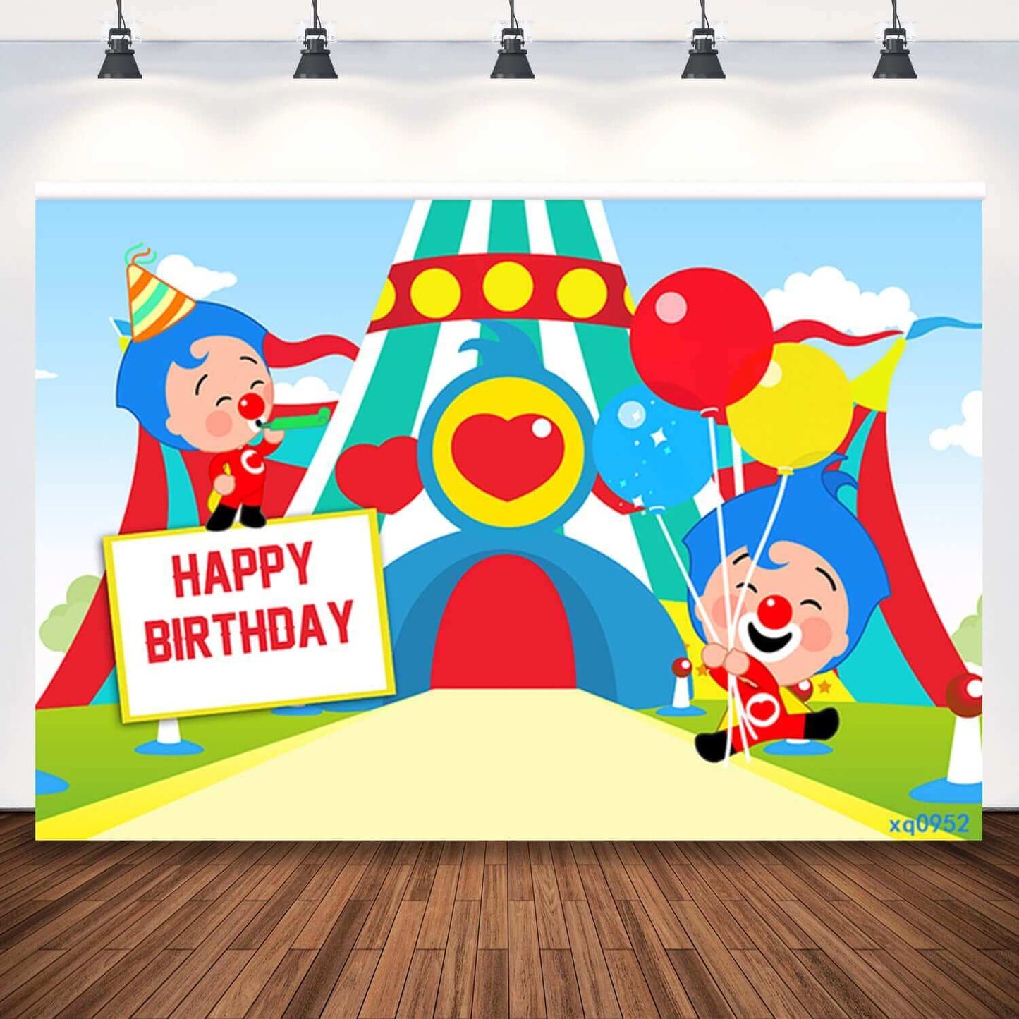 Colorful Cartoon Plim Plim backdrop featuring a circus tent, clowns holding balloons, and a 'Happy Birthday' sign on a bright and cheerful background.