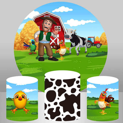 Farm-themed party set featuring a round Granja de Zenón backdrop with a farmer, cow, rooster, and barn, and matching cylinder covers with farm-themed designs.