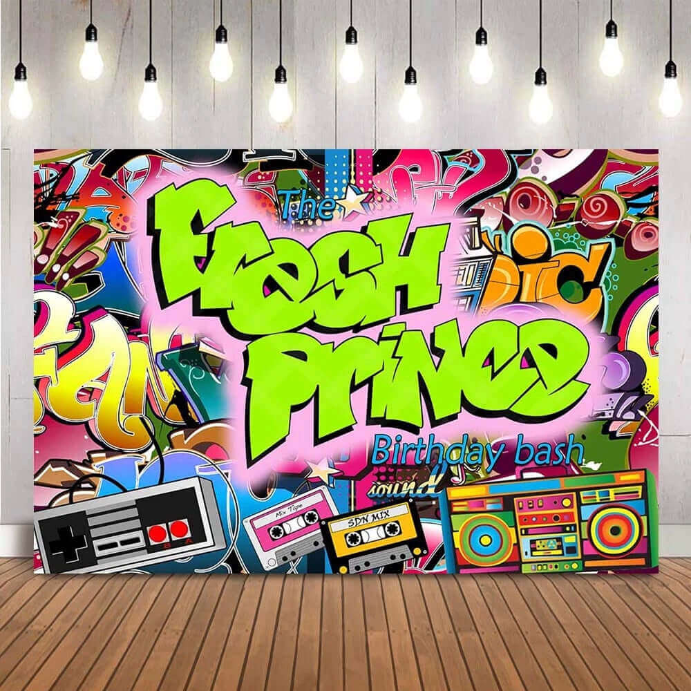 Graffiti-themed party backdrop featuring bold neon 'Fresh Prince Birthday Bash' text with colorful 90s elements, including cassette tapes, a boombox, and retro game controllers on a vibrant urban background.