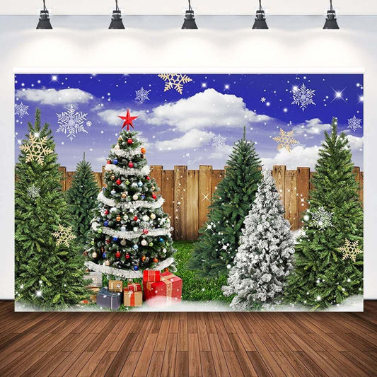 Holiday-themed backdrop featuring decorated Christmas trees, sparkling snowflakes, and presents for festive photo shoots.