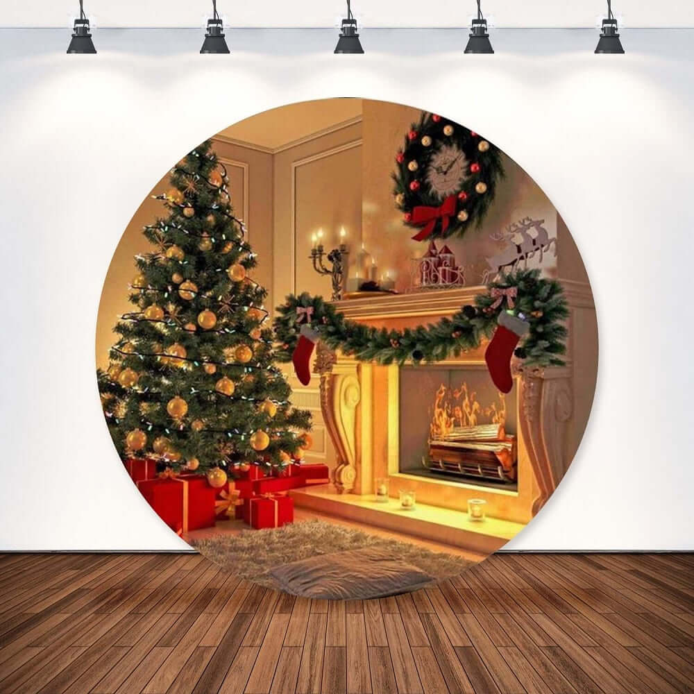 Round Christmas backdrop featuring a decorated tree with ornaments and gifts, a cozy fireplace with garlands and stockings, and a festive wreath with a red bow.