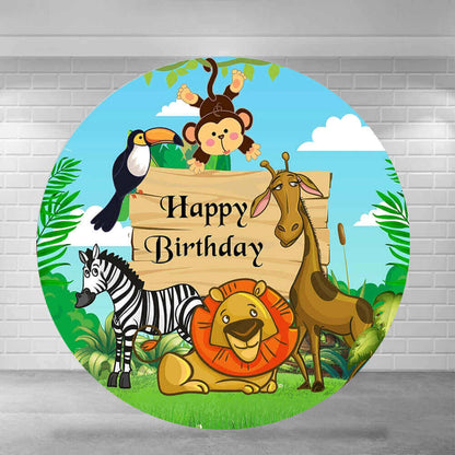 Colorful jungle-themed round backdrop featuring cartoon animals such as a lion, zebra, giraffe, monkey, and toucan with a "Happy Birthday" banner, ideal for kids’ birthday parties.