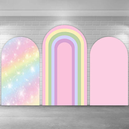 Three-panel arched backdrop set featuring a glittery pastel rainbow panel, a bold striped rainbow arch in soft colors, and a solid pastel pink panel, perfect for birthday parties, baby showers, and modern event styling.