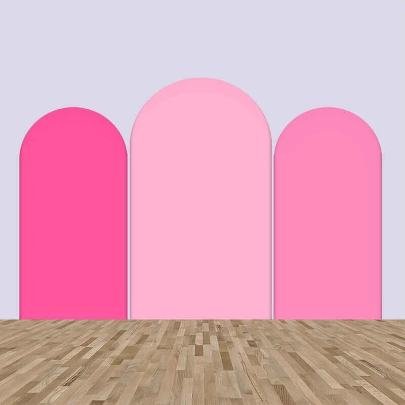 Three-panel solid pink gradient arched backdrop set featuring shades of bright pink, soft pink, and light pink, ideal for weddings, baby showers, and modern event decor.