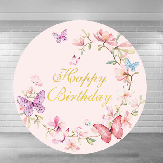 Round birthday-themed party backdrop with a floral wreath design, pink and blue butterflies, and a 'Happy Birthday' message in gold script.