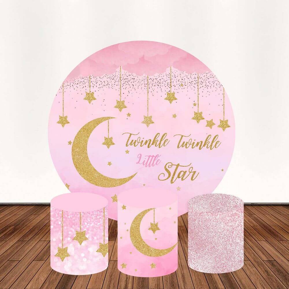 A "Twinkle Twinkle Little Star" themed photography set, including a round pink and gold backdrop with stars, moons, and the phrase "Twinkle Twinkle Little Star," along with three plinth covers decorated with golden moons and pink sparkles, ideal for girls' birthday parties, baby showers, or photo shoots.