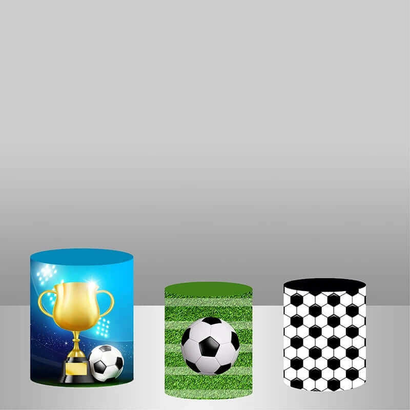 Set of three cylinder covers with complementary soccer-themed designs: a blue cover with a golden trophy and soccer ball, a green grass-textured cover with a soccer ball, and a black-and-white hexagonal soccer ball pattern cover.