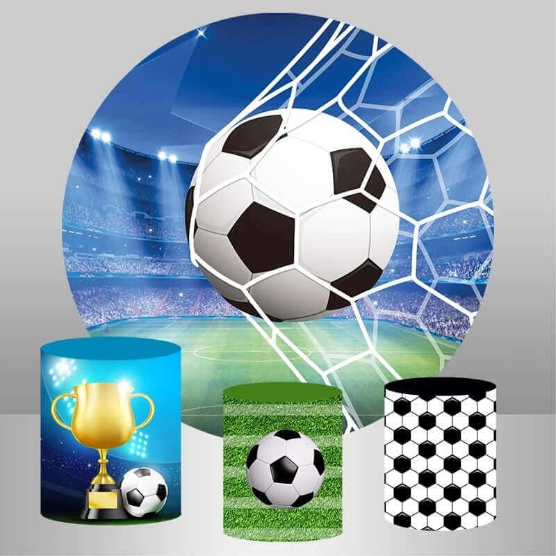 Round soccer sports field backdrop with a soccer ball in the net, accompanied by three cylindrical covers with soccer-themed designs, including a trophy, grass, and hexagonal patterns.