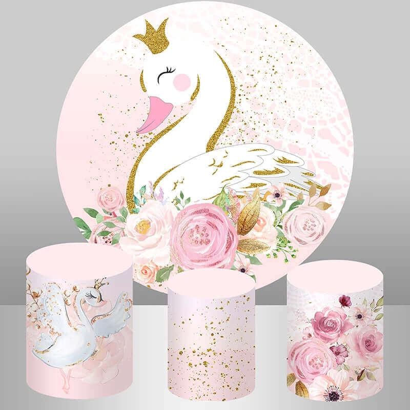 Swan-themed birthday party backdrop featuring a golden swan with a crown, pink floral accents, and gold splatter details, paired with three plinth covers in floral, gold splatter, and swan designs.