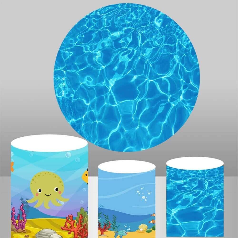 An underwater scene backdrop displaying realistic blue ocean waves, accompanied by three cylinder covers with playful sea creature illustrations, ideal for children's parties and marine-themed events.